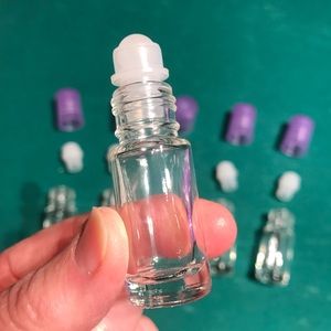 5 mini refillable bottles w/“roller” applicator holds either oils or fragrance